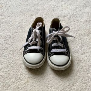 Black Converse Chuck Taylor sneakers. Size 8.